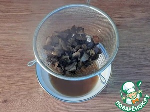 Минтай запечённый под грибным соусом
