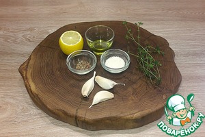 Щучья голова с чесноком в духовке